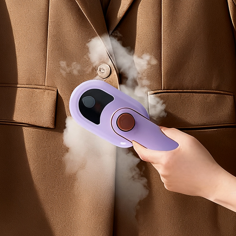 Bærbart roterende håndholdt dampstrykejern