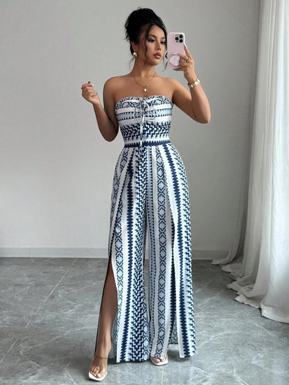 👗💙 אוברול גיאומטרי עם מחשוף הלטר וחתך בצד – 50% הנחה! מושלם לחוף, למשרד ולערב. 🔥✨