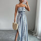 👗💙 אוברול גיאומטרי עם מחשוף הלטר וחתך בצד – 50% הנחה! מושלם לחוף, למשרד ולערב. 🔥✨